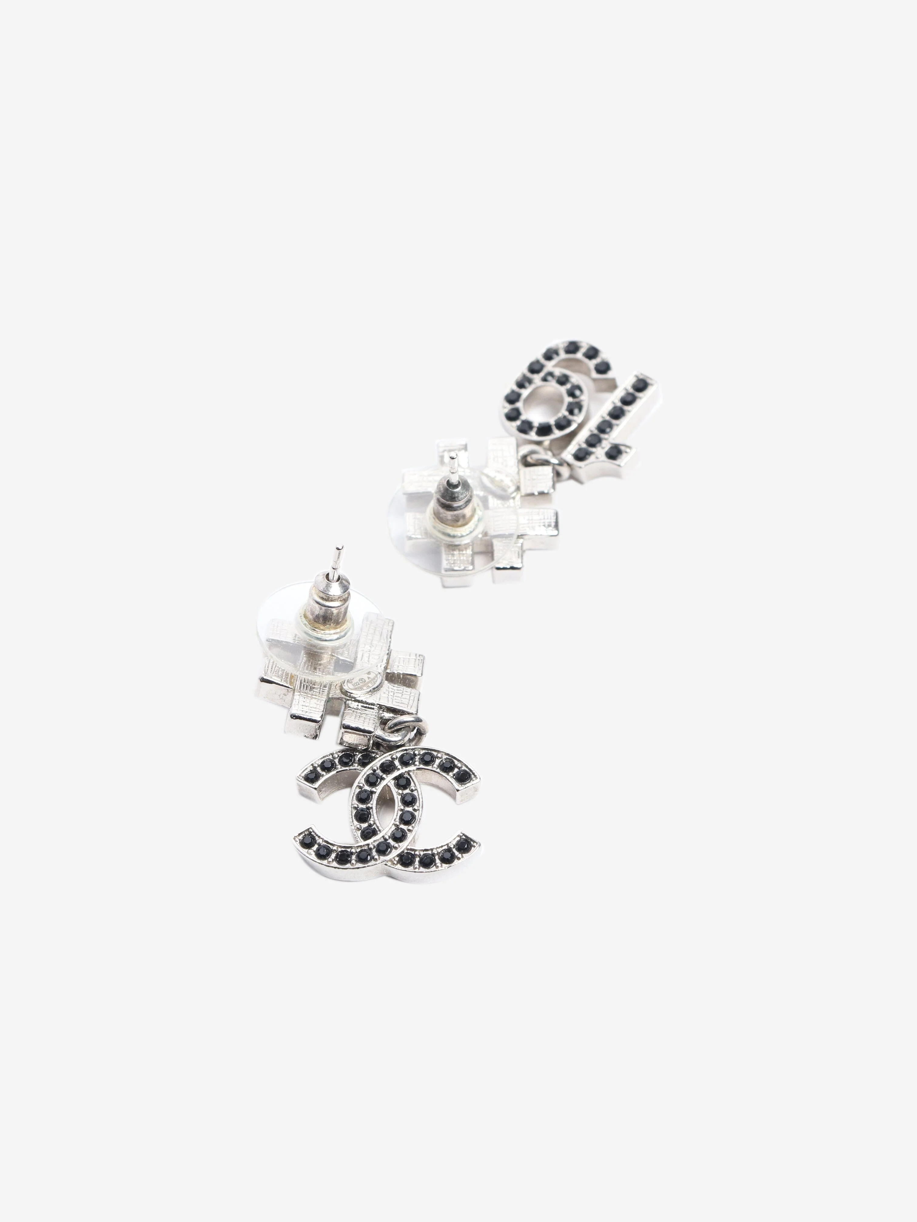 Silver and black CC 19 earrings - Image 2