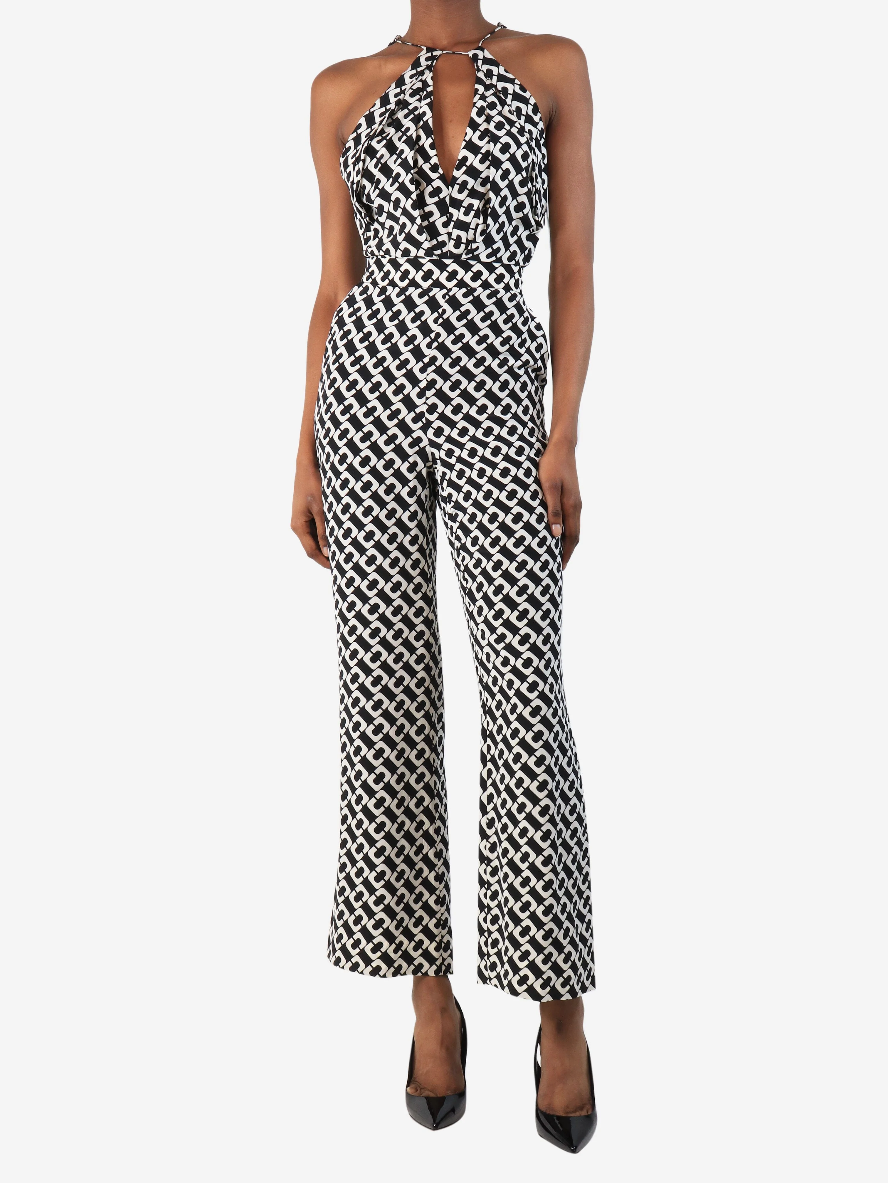 Black all-over printed jumpsuit - size UK 4