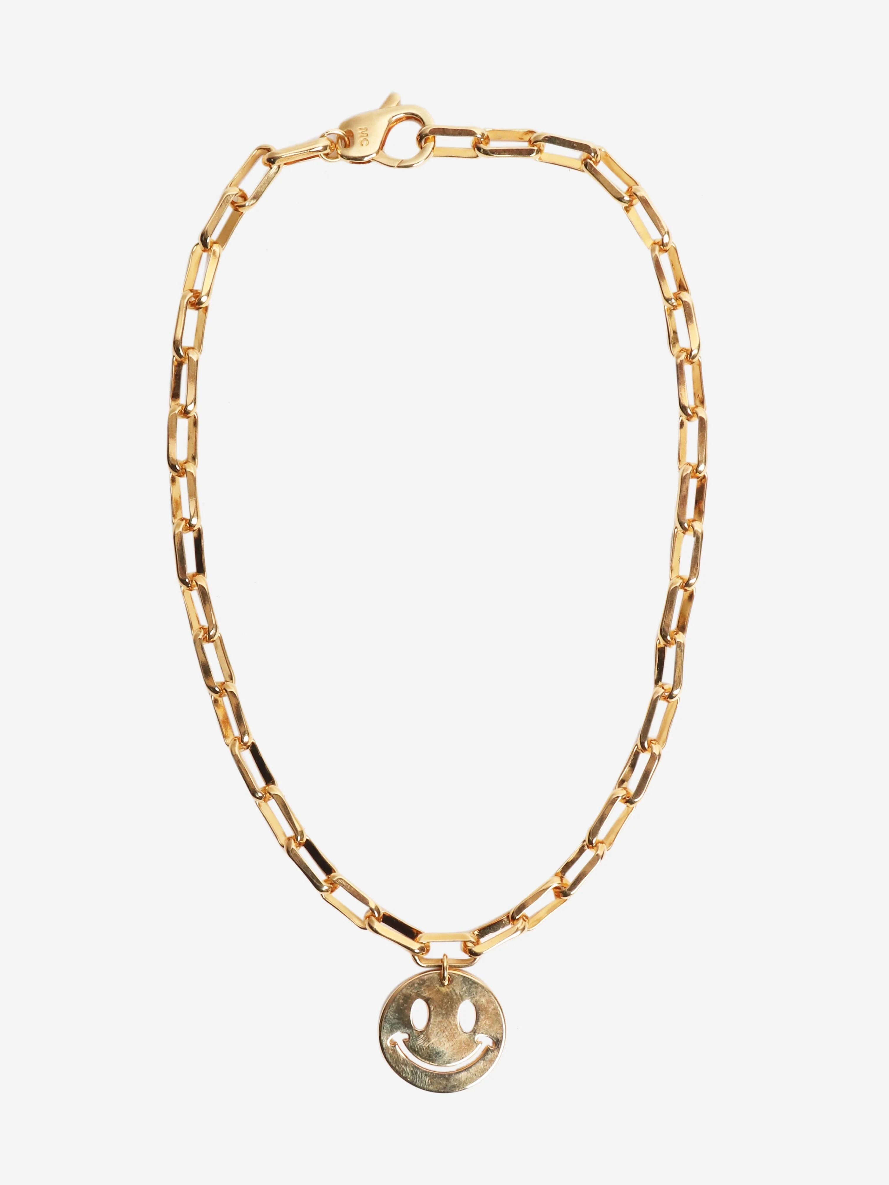 Gold smiley face necklace