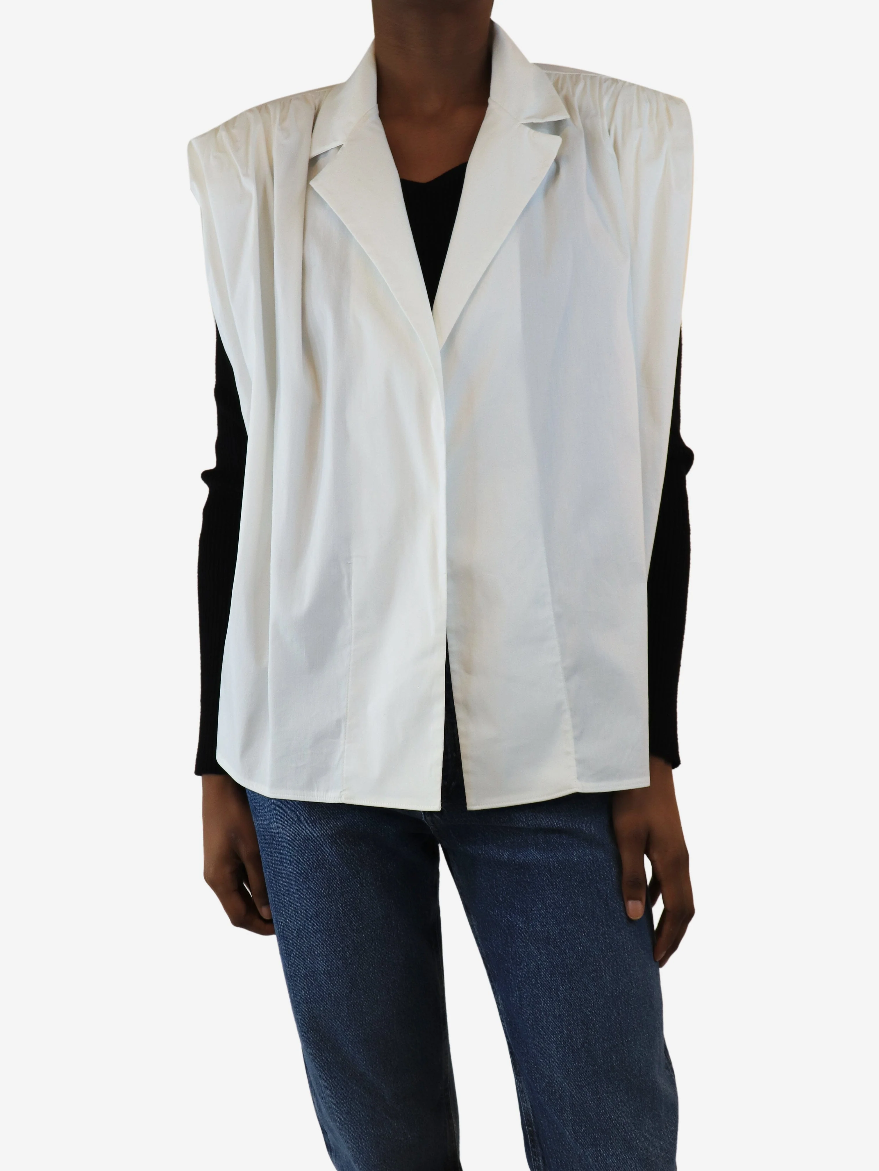 White sleeveless shirt - size UK 4